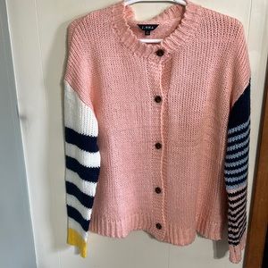 J.NNA sweater. Super cute w/ multi colored sleeves. Size Medium-fits oversized